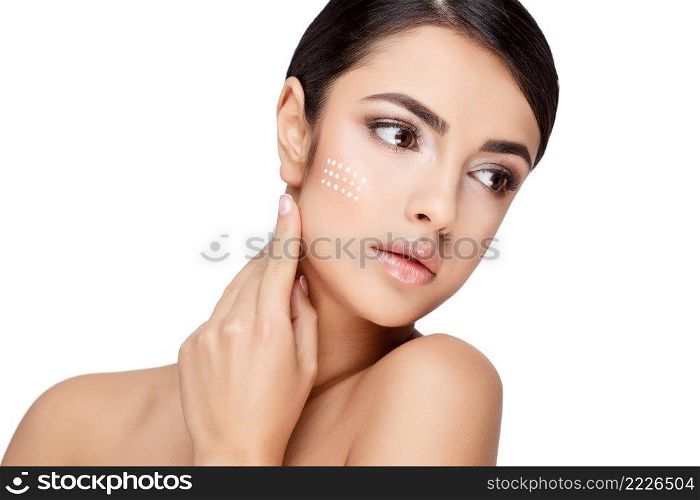 Brunette young woman with beautiful clean skin isolated on white. Young brunette woman with beautiful clean skin