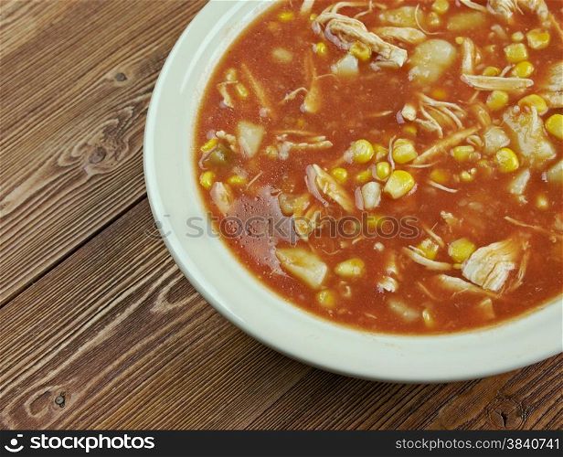Brunswick stew - traditional dish, popular in the American South. made with chicken, tomatoes, corn, lima beans, green peppers and potatoes.