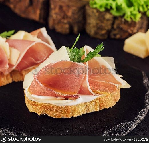 bruschetta set with parma ham and parmesan cheese