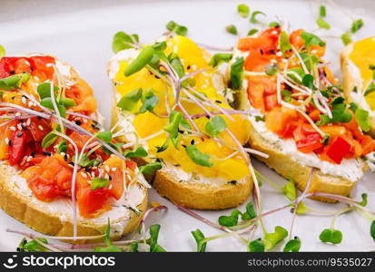 bruschetta with cream cheese and multi-colored grilled bell pepper