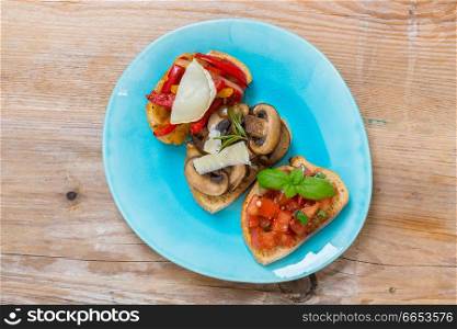 Bruschetta with tomatoes, mushrooms, goat’s cheese.. Bruschetta with tomatoes, mushrooms, goat’s cheese