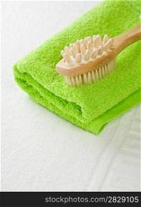 brush on green towel