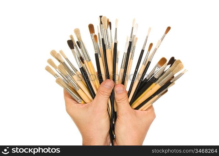 brush to draw in hand isolated on white