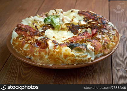 Bubble and Squeak-traditional English dish made fried leftover vegetables, potato and brussel sprouts, cabbages