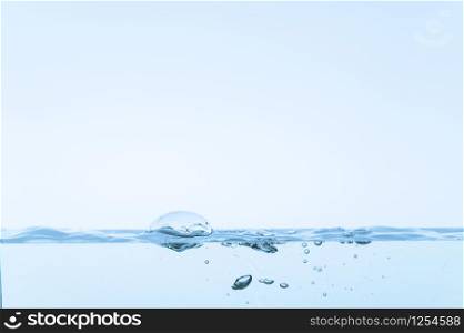 Bubbles in blue water White background
