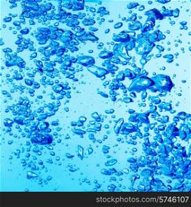 bubbles under water on blue background. Bubbles under water