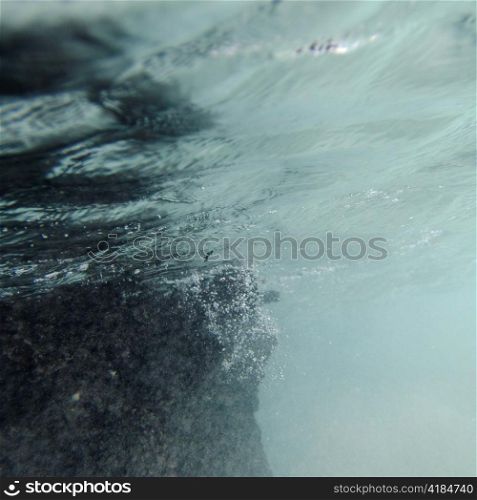 Bubbles underwater, Puerto Egas, Santiago Island, Galapagos Islands, Ecuador