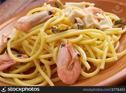 Bucatini - plate pasta with seafood