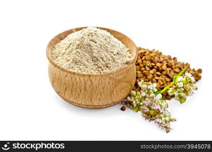 Buckwheat flour in a wooden bowl, buckwheat, buckwheat flower isolated on white background