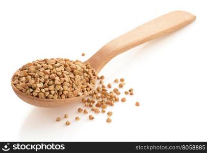 buckwheat groats in spoon isolated on white background