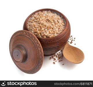 buckwheat in pot isolated on white background