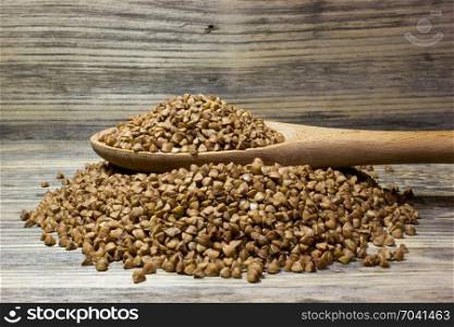 Buckwheat on wooden background