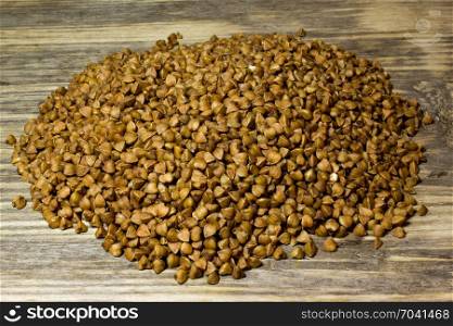 Buckwheat on wooden background