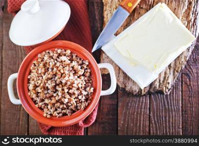 buckwheat with butter on the wooden table