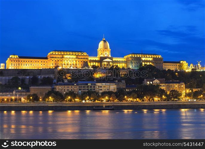 Buda Castle (Royal Palace) and Danube river at night. Budapest, Hungary.