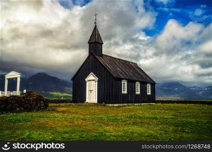 Budakirkja church in Snaefellsnes peninsula, Iceland. This black church sits alone in Budaahraun lava field, West of Iceland.