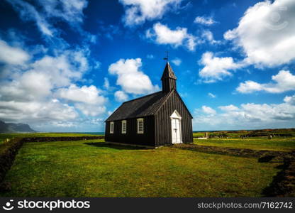 Budakirkja church in Snaefellsnes peninsula, Iceland. This black church sits alone in Budaahraun lava field, West of Iceland.