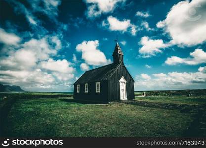 Budakirkja church in Snaefellsnes peninsula, Iceland. This black church sits alone in Budaahraun lava field, West of Iceland.