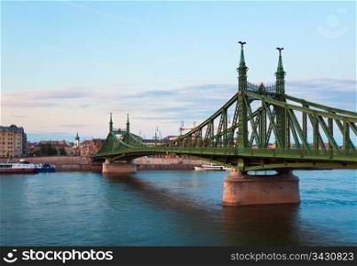 Budapest Liberty Bridge across the Danube river . Evening cityscape.