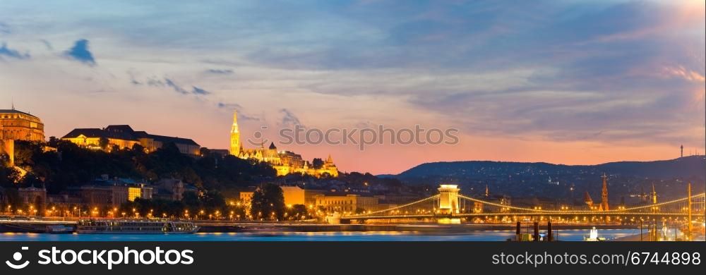 Budapest night view. Long exposure. Hungarian landmarks, Chain Bridge and Royal Palace. Two shots stitch image.
