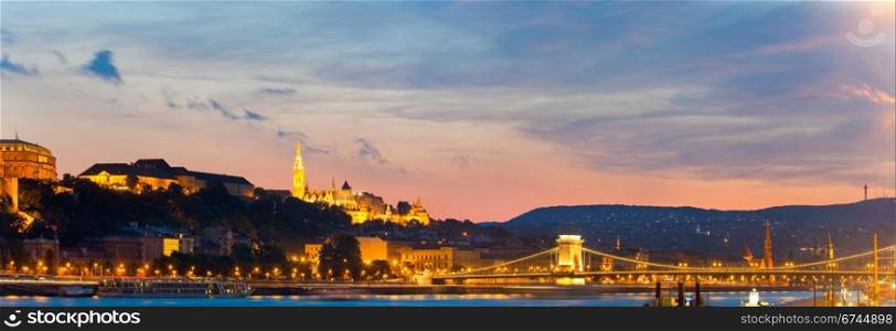 Budapest night view. Long exposure. Hungarian landmarks, Chain Bridge and Royal Palace. Two shots stitch image.