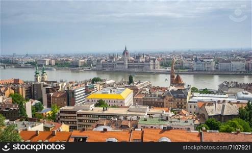 Budapest Parliament Building with view of Danube River in Hungary.