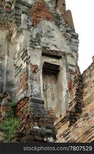 Buddha and brick stupa in Ayutthaya, Thailand