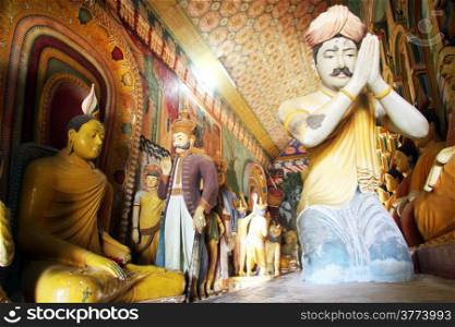 Buddha and statues in buddhist monastery Wewurukannala Vihara near Dikwella, Sri Lanka