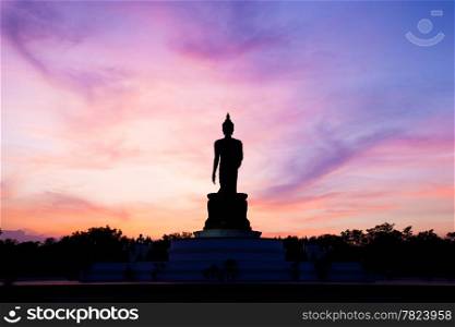 Buddha at sunset. When the evening sun is bright red. Lord Black is a sleek backlit.
