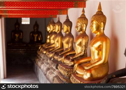 Buddha golden brown. The line inside the temples of Thailand.