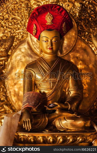 Buddha Sakyamuni statue in Lamayuru Gompa (Tibetan Buddhist monastery). Ladakh, India. Buddha statue in Lamayuru monastery, Ladakh, India