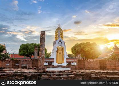 Buddha statue at sunset are Buddhist temple and major tourist attractions at Wat Phra Si Rattana Mahathat also colloquially referred to as Wat Yai is a Buddhist temple (wat) in Phitsanulok,Thailand.