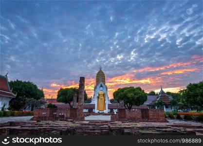 Buddha statue at sunset are Buddhist temple at Wat Phra Si Rattana Mahathat also colloquially referred to as Wat Yai is a Buddhist temple It is a major tourist attractions in Phitsanulok,Thailand.