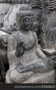 Buddha statue in Panjiayuan antique market, Beijing, China
