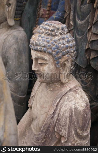 Buddha statue in Panjiayuan antique market, Beijing, China