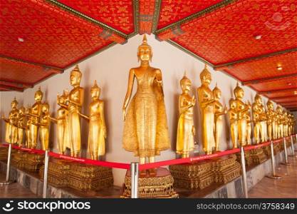 Buddha statue in the temple. In the same manner many Buddhas.