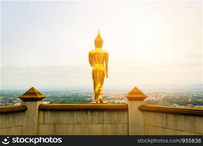 Buddha statue on mountain hill and landscape Nan Province in Thailand