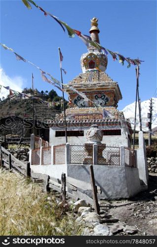 Buddhist dagoba in villsge in Nepal