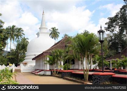 Buddhist monastery with white stupa in Badella, Sri Lanka