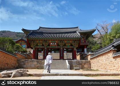 Buddhist monk walking at Beomeosa temple in Busan city, South Korea