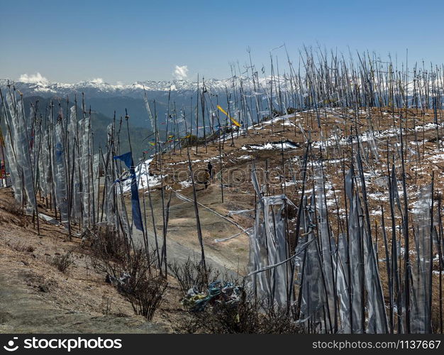 Buddhist prayer flags high in the Himalayan Mountains in the Kingdom of Bhutan.