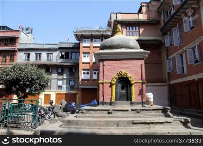 Buddhist shrine in the inner yard of residential district of Patan, Nepal