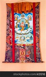 Buddhist thangka - a Tibetan Buddhist painting on cotton, or silk applique - in a monastery in Gangtok, Sikkim, India