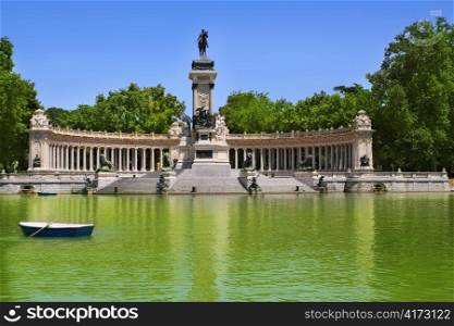 Buen Retiro park lake in Madrid with fallen angel statue