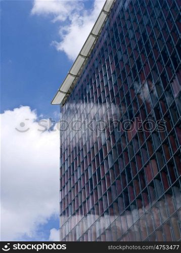 Buerohochhaus-Wolken. facade of a berlin office building with many windows