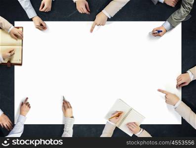 Build your business team. Top view of people hands drawing networking strategy