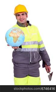 Builder holding a globe