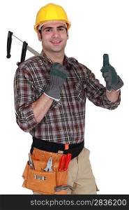 Builder holding calipers and giving the thumbs-up