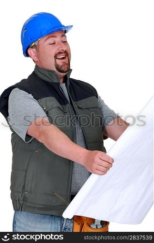 Builder laughing at plans