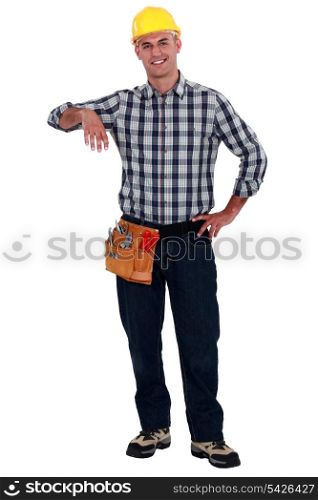 Builder leaning on invisible item